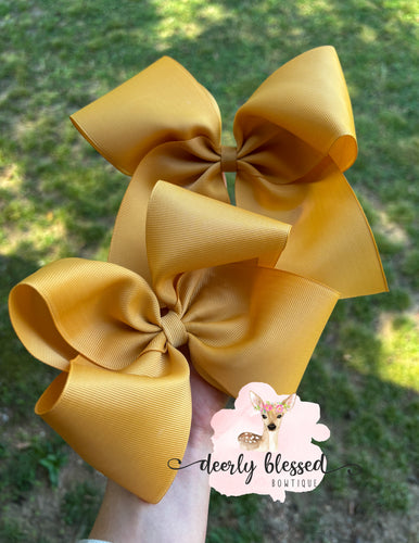 Gold ribbon bow