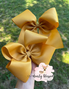 Gold ribbon bow