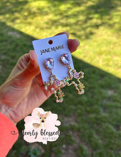 Floral cross earrings